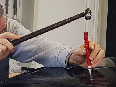 Auto uitdeuken zonder spuiten autoschadeherstel Hannen Autopark